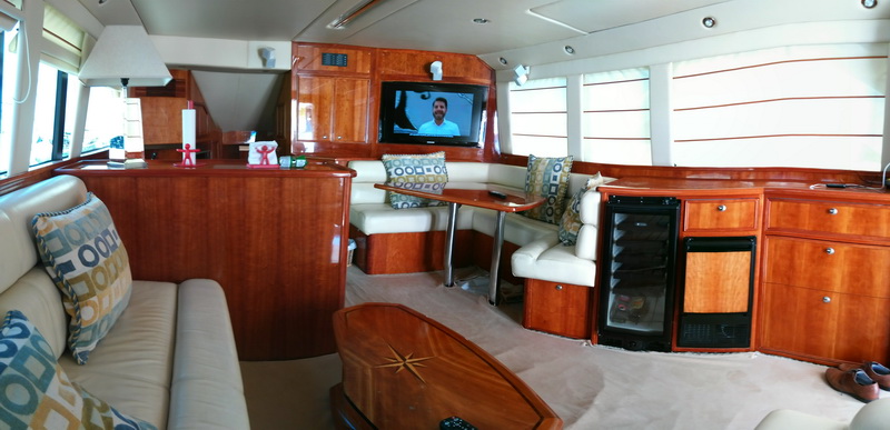 Riviera 51 ft sportfisher cockpit with fighting chair outriggers rigged marlin Cancun