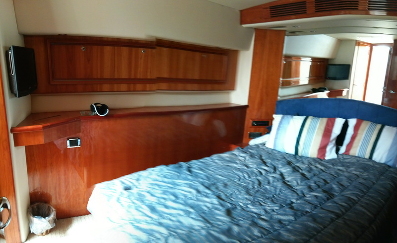 Riviera 51 ft sportfisher crew preparing fishing gear marlin sailfish charter Cancun