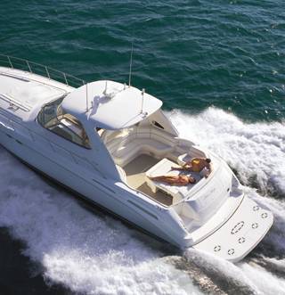 Sea Ray Sundancer 54 ft Solivia twin Caterpillar 500HP engines 26 knots Cancun private charter