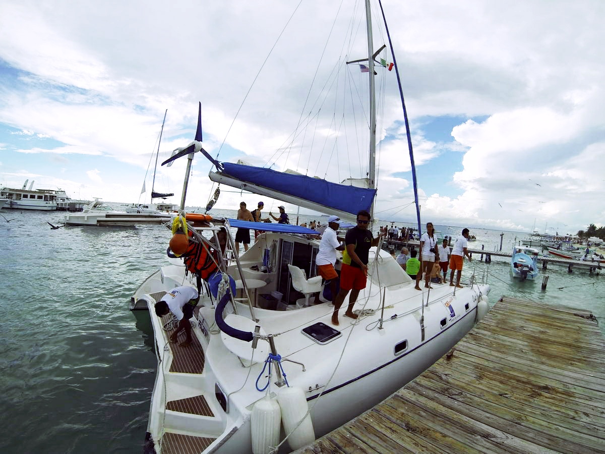 Catmania catamaran sailing Cancun vacation open bar snorkel Caribbean Isla Mujeres group charter tour