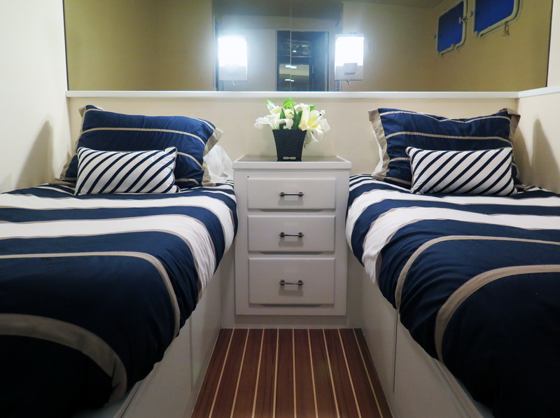 Classic 80ft Burger motor yacht charter at Puerto Aventuras marina, Riviera Maya
